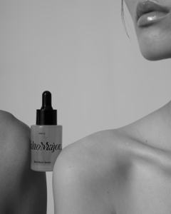 Halto Major Blue Moon Serum in between 2 models shoulder