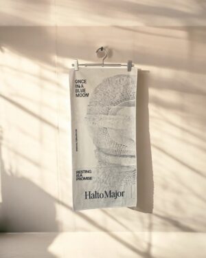 Totem Towel under the sunlight with white wall